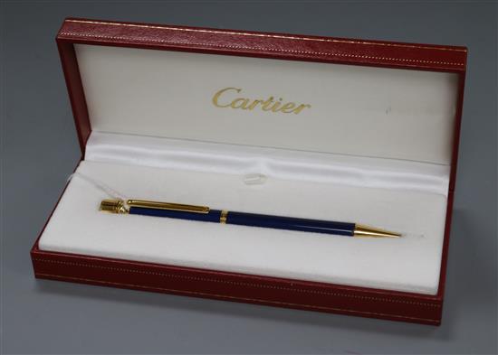 A Must de Cartier Trinity blue and gold-coloured ballpoint pen, boxed